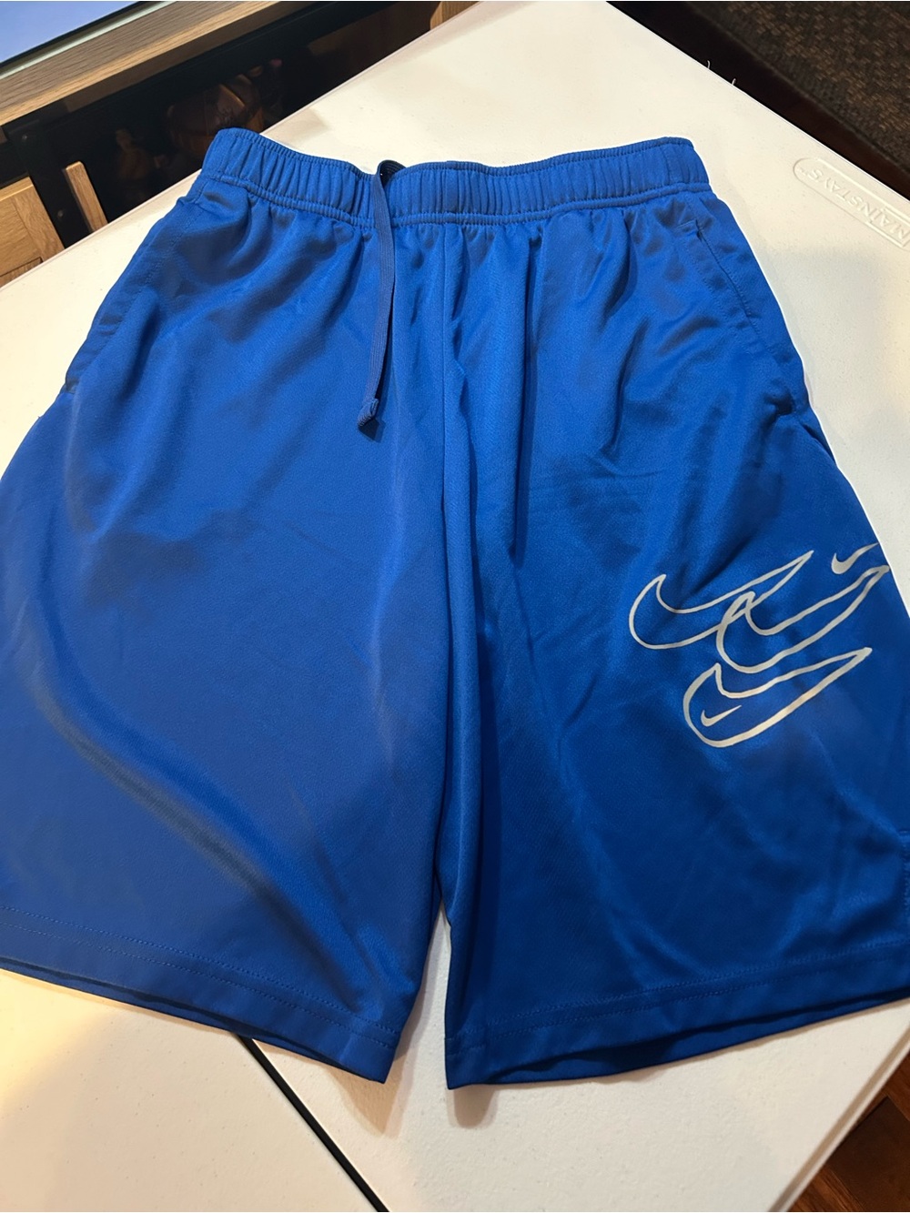 Nike Blue Athletic Shorts with White Swoosh Stack